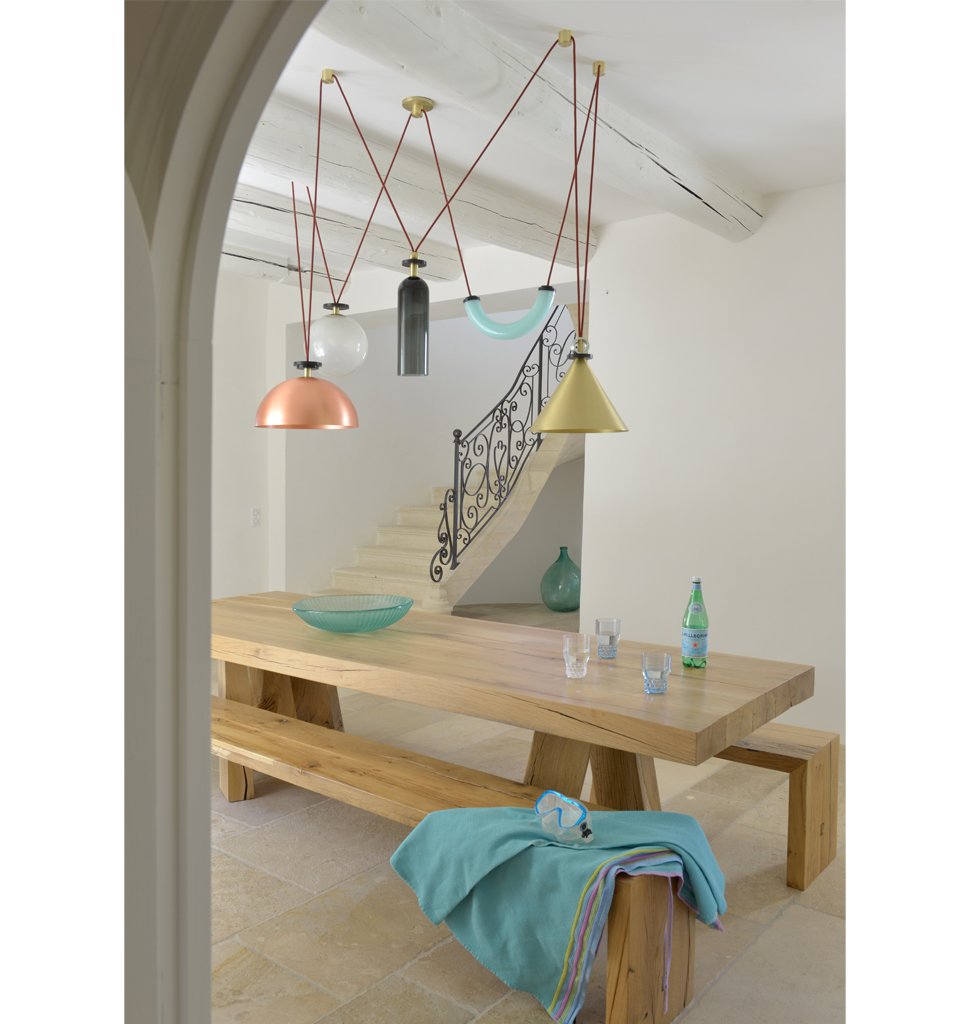 5-Piece Chandelier (Brushed brass cone/Brushed copper hemisphere) — Cassis, France. Interior by David Price. Image by Hervé Hôte