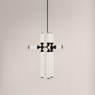 Modern pendant light with black and white design on a neutral background
