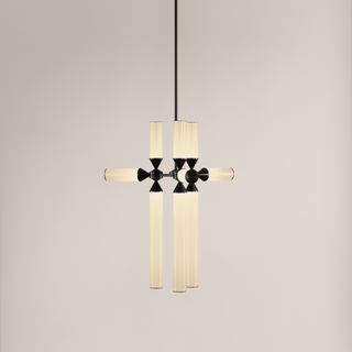 Modern pendant light with gold and black design on a neutral background
