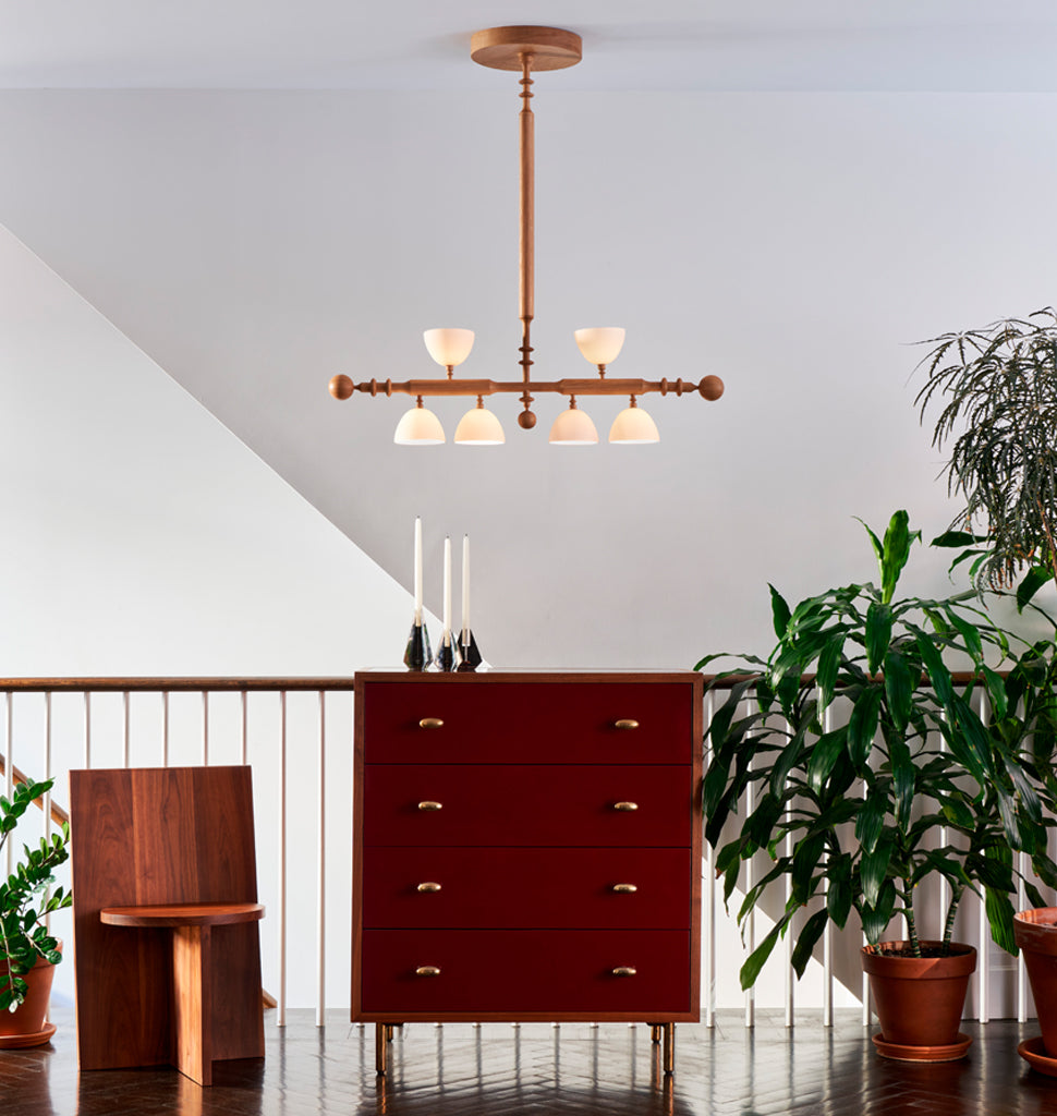 Two Arm Pendant (White oak/White bone china) — Roll & Hill Showroom, New York City. Image by Louisa Fulkerson + Fyodor Shiryaev