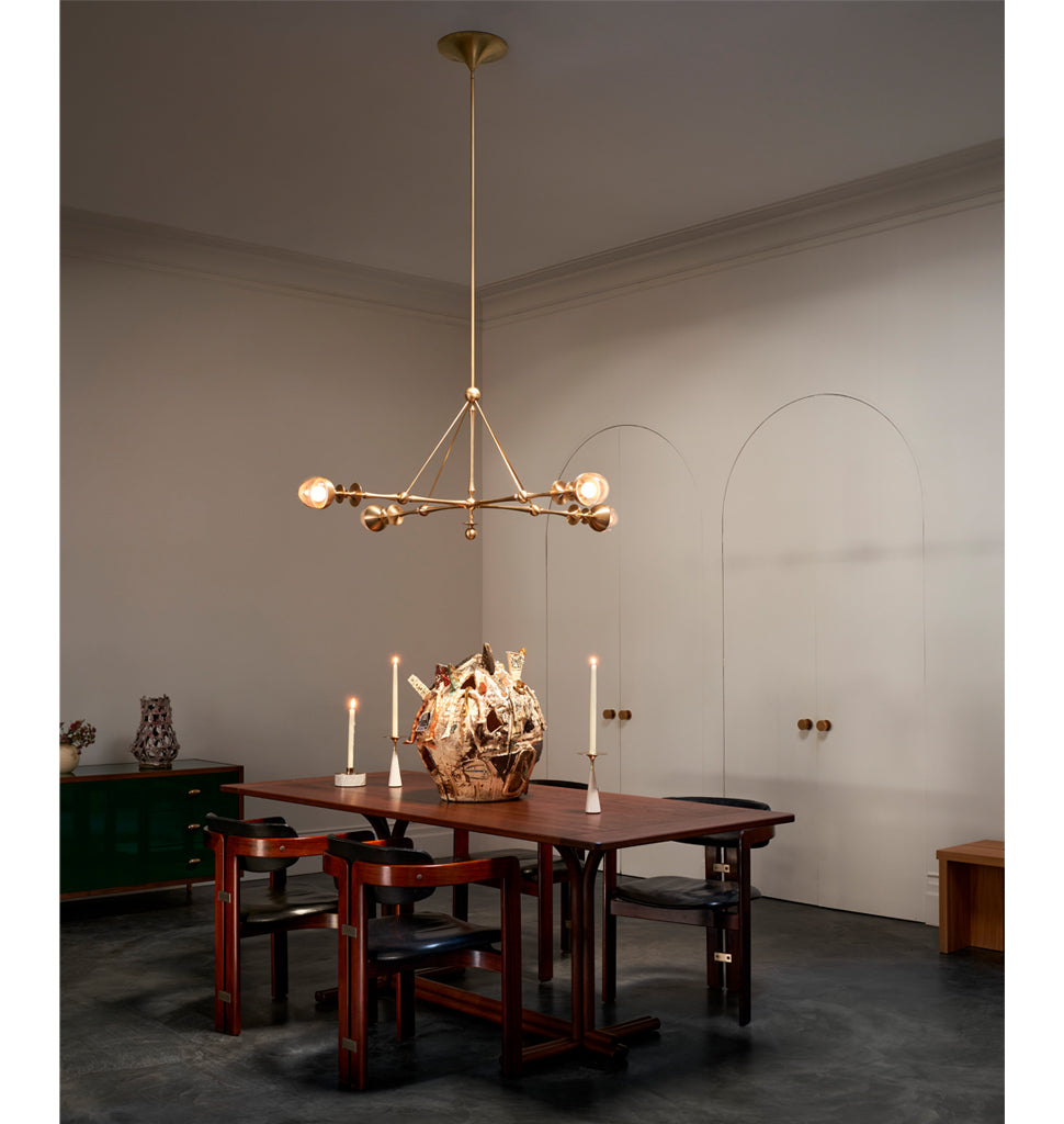 Four Arm Pendant (Unlacquered brass/Clear glass) — Roll & Hill Showroom, New York City. Image by Louisa Fulkerson + Fyodor Shiryaev