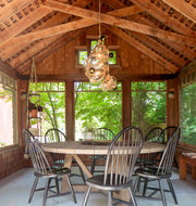 Chandelier - 1 Lg, 2 Sm Bubbles, 5 Barnacles (Khaki/Clear) — Bellport, New York. Interior by Elizabeth Roberts Architects. Image by Eric Striffler